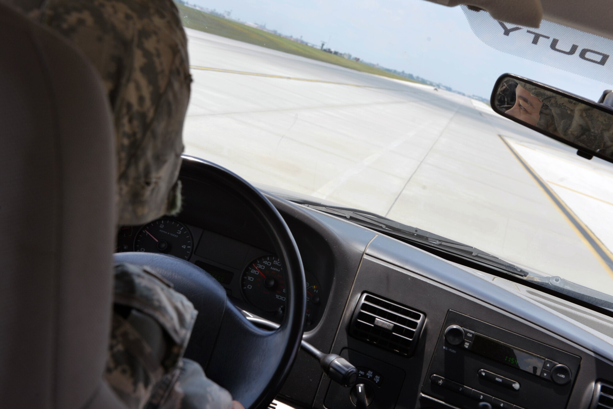 U.S. Air Force Staff Sgt. Trisha Dodds, 39th Operations Support Squadron airfield management operations supervisor, scouts the runway during an airfield indirect fire exercise, May 27, 2017, at Incirlik Air Base, Turkey. Dodds swept the area in search of a simulated unexploded ordnance. (U.S. Air Force photo by Senior Airman John Nieves Camacho)