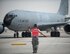 A U.S. Air Force airman with the 379th Expeditionary Aircraft Maintenance Squadron marshals a KC-135 Stratotanker at Al Udeid Air Base, Qatar, May 29, 2017. The KC- 135 Stratotanker Aircraft Commander, Brig. Gen. Darren James, wing commander of the 379th Air Expeditionary Wing, just completed his fini-flight. The fini-flight is a time honored aviation tradition which marks the end of James’ flying status as wing commander of the 379th AEW. During his time as wing commander, James flew over 325 hours and 40 sorties.  (U.S. Air Force photo by Tech. Sgt. Amy M. Lovgren)