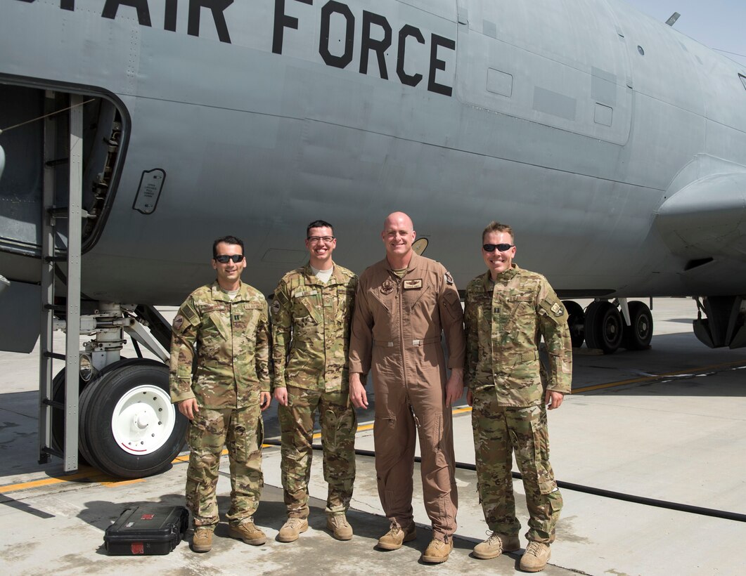 U.S. Air Force Brig. Gen. Darren James, wing commander of the 379th Air Expeditionary Wing, poses for a photograph with fellow aircrew members from the 340th Expeditionary Air Refueling Squadron at Al Udeid Air Base, Qatar, May 29, 2017. James just completed his fini-flight which is s time honored aviation tradition that marks the end of his flying status as wing commander of the 379th AEW. During James’ time as wing commander, he flew over 325 hours and 40 sorties.  (U.S. Air Force photo by Tech. Sgt. Amy M. Lovgren)