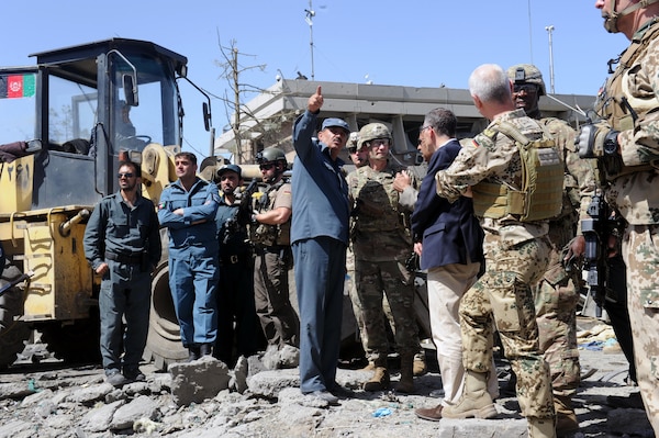 KABUL, Afghanistan (May 31, 2017) — General John Nicholson, Resolute Support commander, RS Chief of Staff Lieutenant General Jurgen Weigt, and RS Command Sergeant Major David M. Clark visit the blast site after the deadly attack that occurred here today to survey the damage and support emergency. A vehicle-borne improvised explosive device was detonated near Zambaq Square outside the Green Zone, near diplomatic and government facilities. (U.S. Navy photo by Lt. j.g. Egdanis Torres Sierra, Resolute Support Public Affairs – Afghanistan)