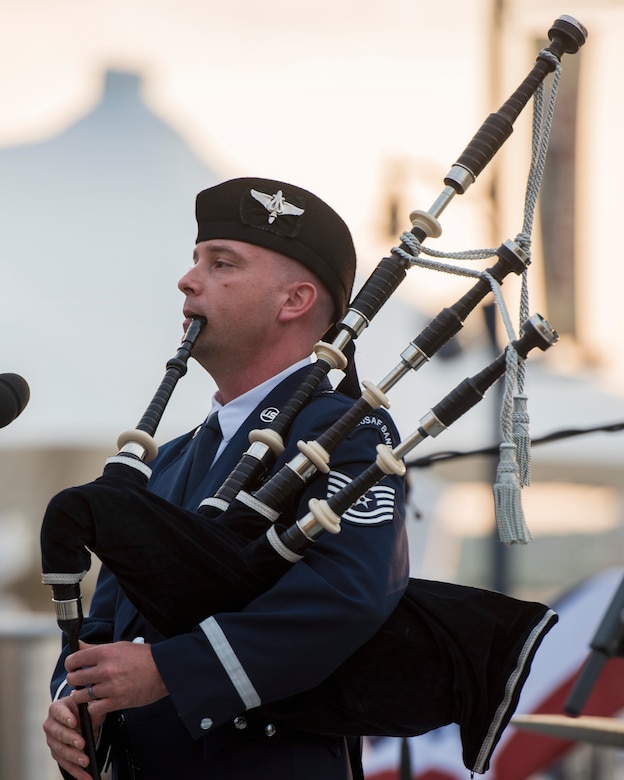 Tech. Sgt. Adam Tianello, U.S. Air Force Band’s Celtic Aire ensemble bagpiper, plays a bagpipe during a Memorial Day weekend concert at the National Harbor in Fort Washington, Md., May 27, 2017. Audience members had the opportunity to sing along to traditional and folk music, while watching the Air Force’s only official bagpiper perform. (U.S. Air Force photo by Airman 1st Class Valentina Lopez)
