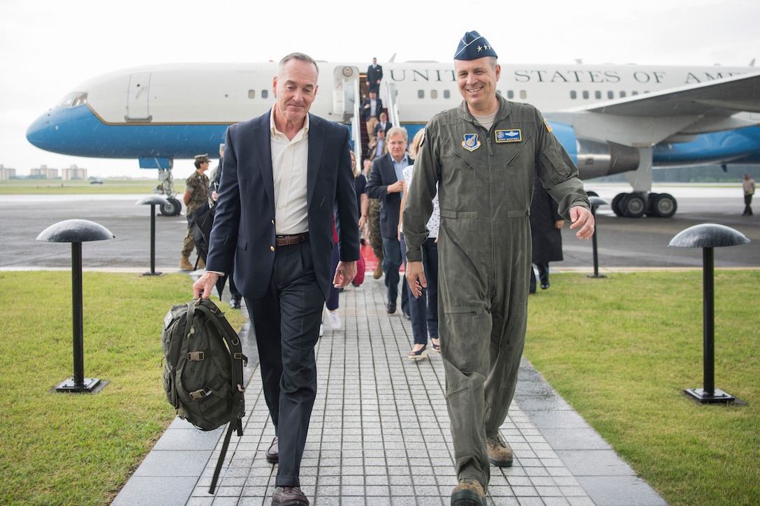 Marine Corps Gen. Joe Dunford, left, chairman of the Joint Chiefs of Staff, walks with Air Force Lt. Gen. Jerry P. Martinez, commander, U.S. Forces Japan, at Yokota Air Base, Japan, June 1, 2017. DoD photo by Navy Petty Officer 2nd Class Dominique A. Pineiro