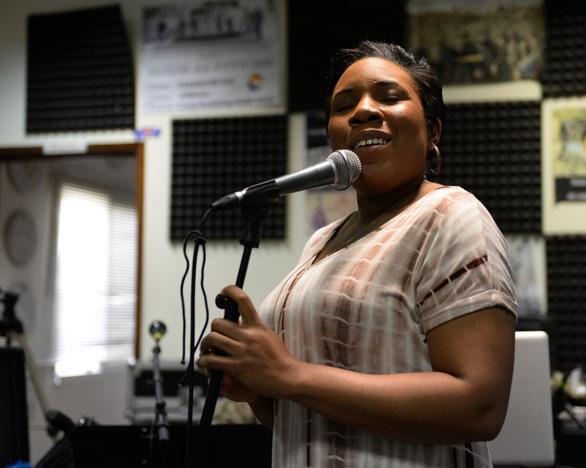 Melinda Doolittle, an accomplished vocalist and top finisher on American Idol, prepares for a concert at Al Udeid Air Base, Qatar, May 25, 2017. Doolittle performed for service members deployed overseas, accompanied by the Air Forces Central Command Band. (U.S. Air Force photo by Tech. Sgt. Bradly A. Schneider/Released)