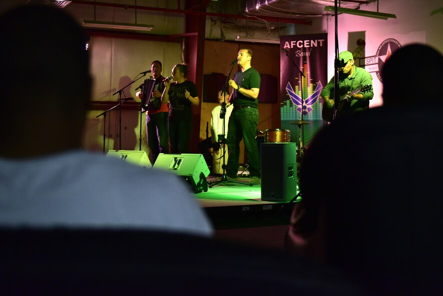 The U.S. Air Forces Central Command Band performs for a crowd of U.S. service members and coalition partners in Southwest Asia on May 31, 2017. These dynamic musicians perform and tour in small ensembles throughout the area of responsibility to positively promote troop morale, diplomacy and outreach to host nation communities. (U.S. Air Force photo by Senior Airman Ramon A. Adelan)