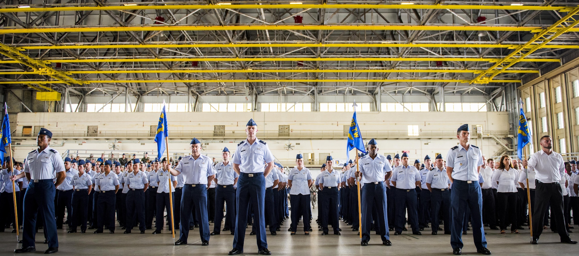 The 96th Test Wing’s Airmen stand in group formations during the 96th Test Wing change of command ceremony at Eglin Air Force Base, Fla., May 31.  Brig. Gen. Christopher Azzano relinquished command to Brig. Gen. Evan Dertien.  The command position is Dertien’s third assignment to Team Eglin.  (U.S. Air Force photo/Samuel King Jr.)