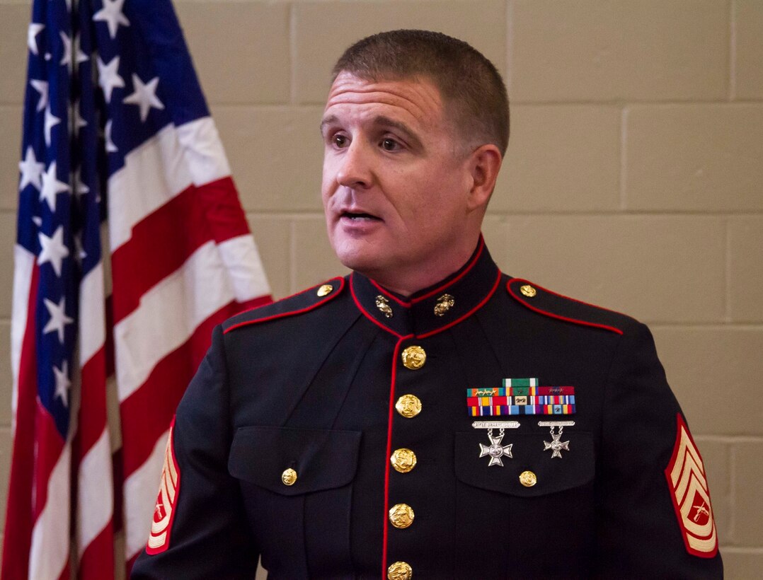 Gunnery Sgt. Matthew Hoyle, the station commander for Recruiting Substation Dothan, Alabama, speaks to students, faculty and family members of Gracyn LaSueur at Northview High School, May 18, 2017, about her selection of Semper Fidelis All-American. As one of only 100 students across America to be chosen, LaSueur is exactly what the Marine Corps is looking for when it comes to a Semper Fidelis All-American. She has turned her obstacles into victories by overcoming odds set against her at a very early age. (U.S. Marine Corps photo by Cpl. Krista James/Released)