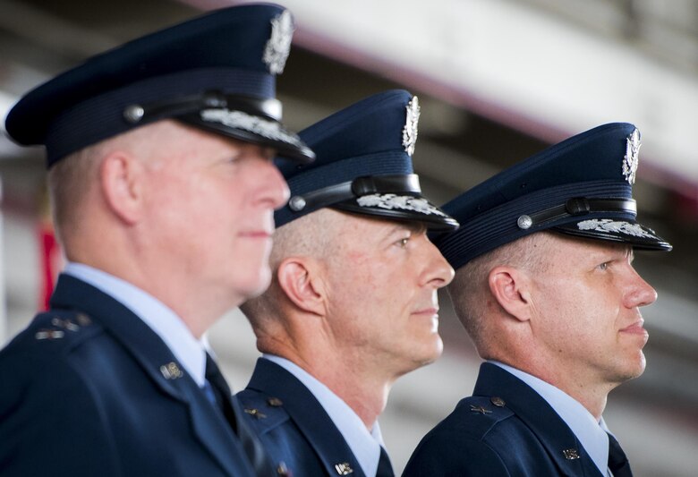 All three 96th Test Wing commanders, Maj. Gen. David Harris, Brig. Gen.s Christopher Azzano and Evan Dertien, stand together during the wing’s change of command ceremony at Eglin Air Force Base, Fla., May 31.  Azzano relinquished command to Dertien.  The command position is Dertien’s third assignment to Team Eglin.  (U.S. Air Force photo/Samuel King Jr.)
