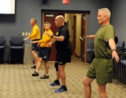 FORT EUSTIS, Va. -- Members of Joint Task Force Civil Support participate in command physical training May 12, 2017. Joint Task Force Civil Support tested its ability to rapidly deploy, set up and operate a forward command post. JTF-CS anticipates, plans, and prepares for Chemical, Biological, Radiological, and Nuclear Defense Support of Civil Authority (CBRN-DSCA) response operations. (Official DOD photo by MC2 Benjamin Liston)