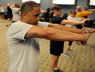 FORT EUSTIS, Va. -- Members of Joint Task Force Civil Support participate in command physical training May 12, 2017. Joint Task Force Civil Support tested its ability to rapidly deploy, set up and operate a forward command post. JTF-CS anticipates, plans, and prepares for Chemical, Biological, Radiological, and Nuclear Defense Support of Civil Authority (CBRN-DSCA) response operations. (Official DOD photo by MC2 Benjamin Liston)
