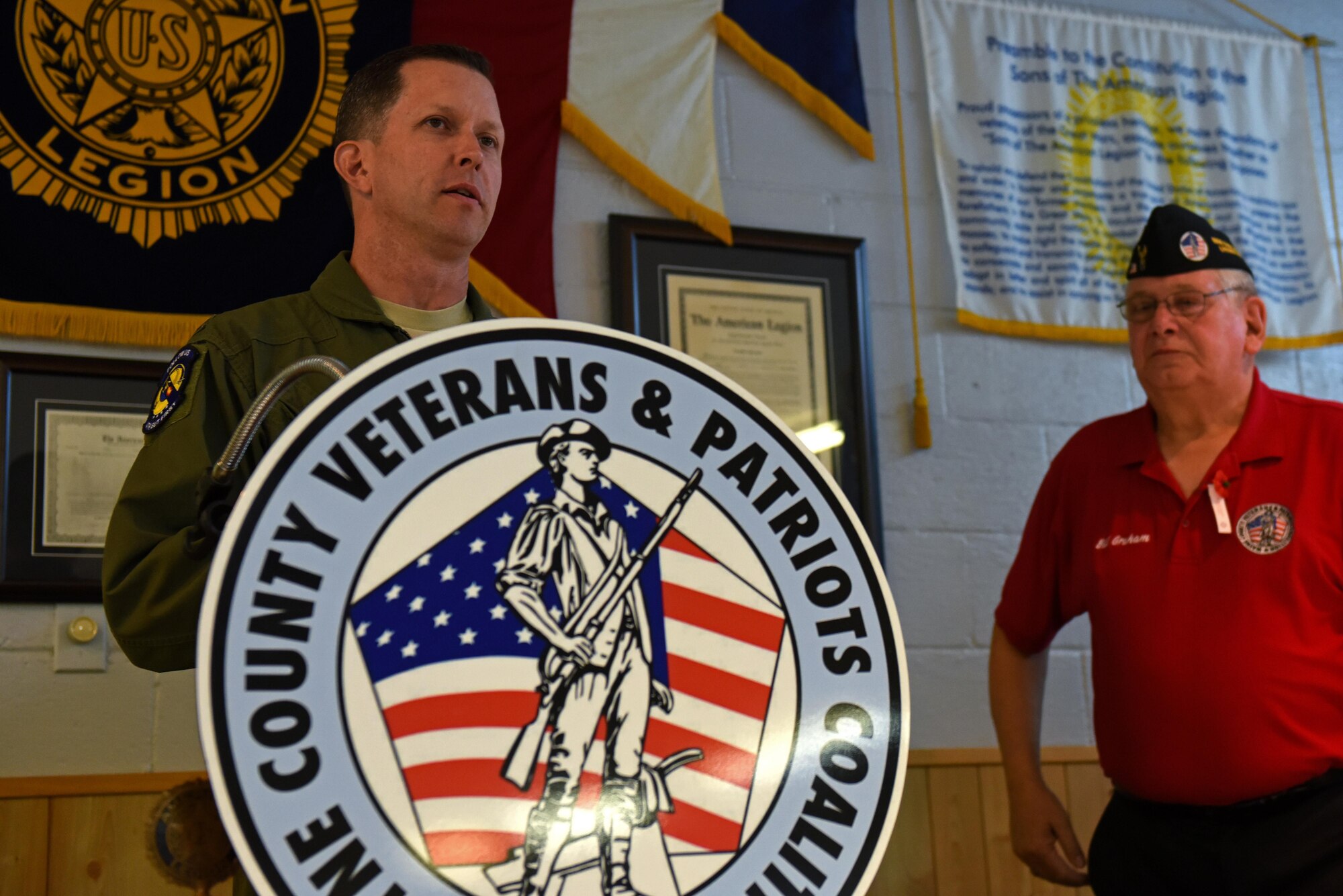Col. Christopher Sage, 4th Fighter Wing commander, speaks at the Wayne County Veterans & Patriots Coalition Post 11, May 27, 2017, in Dudley, North Carolina. In preparation for Memorial Day, veterans and volunteers placed flags on the resting places of veterans in cemeteries all over Wayne County. (U.S. Air Force photo by Senior Airman Ashley Maldonado-Suarez)