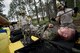 Members of the 23d Civil Engineer Squadron fire department conduct decontamination procedures during a simulated explosives and hazardous material scenario, May 25, 2017, at Moody Air Force Base, Ga. The exercise simulated initial responses from first responders who then contacted other appropriate units after assessing the potential threat while also assisting the simulated victims of hazardous materials. (U.S. Air Force photo by Airman 1st Class Daniel Snider)