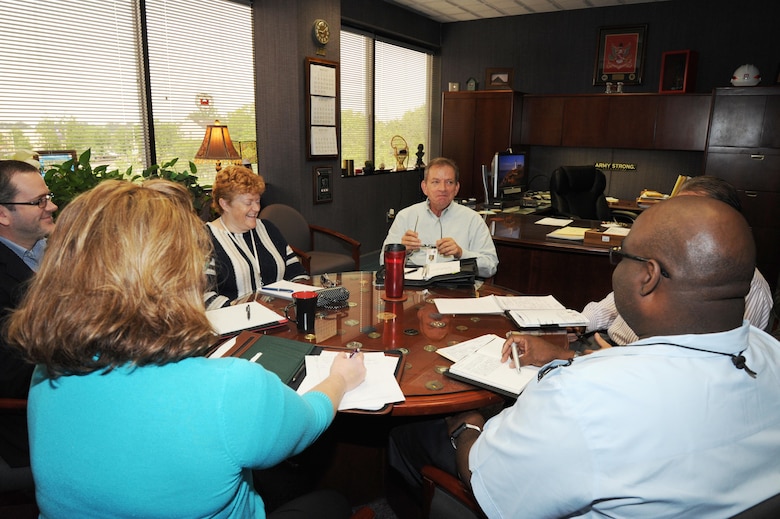 Albert "Chip" Marin III, U.S. Army Engineering and Support Center, Huntsville's new programs director, speaks to his team during a recent director's meeting.