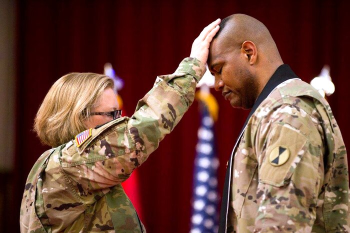 Army Chaplain (Lt. Col.) Khallid Shabazz, right, participates in a ceremony in which he became the 7th Infantry Division chaplain at Joint Base Lewis-McChord, Wash., May 23, 2017. Shabazz is the Army's first Muslim chaplain at the division level. Courtesy photo
