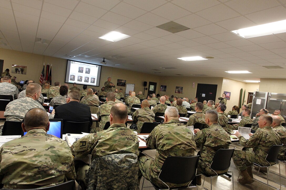 U.S. Army Reserve battalion command teams listen to opening remarks from Col. Robert Cooley, 85th Support Command deputy commander, during a New Command Teams Orientation held at 85th Support Command Headquarters in Arlington Heights, Ill., May 19-20, 2017. The orientation gave battalion command teams and Brigade Support Element staffs assigned to 85th Support Command, but operationally controlled by First Army, a better understanding of the practices and procedures that make up the hybrid relationship between First Army and the 85th SPT CMD. (U.S. Army photo by Master Sgt. Anthony L. Taylor)