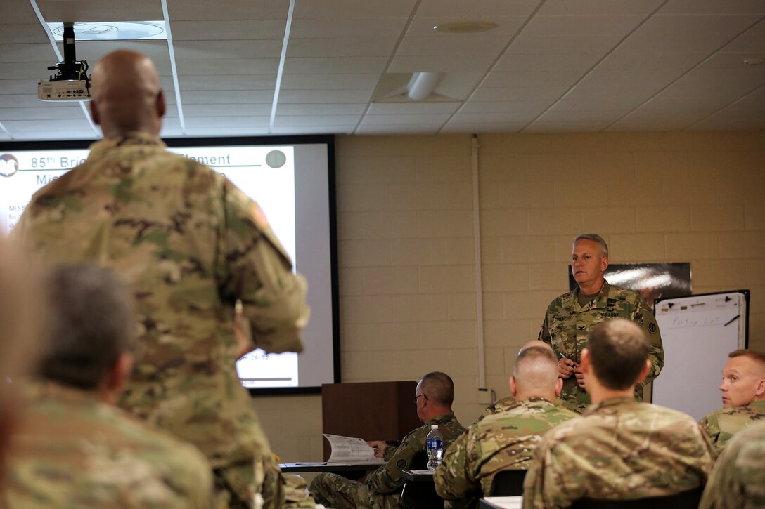 Col. Robert Cooley, right, 85th Support Command deputy commander, talks with battalion command team members during a New Command Teams Orientation held at 85th Support Command Headquarters in Arlington Heights, Ill.,  May 19-20, 2017. The orientation gave battalion command teams and Brigade Support Element staffs assigned to 85th Support Command, but operationally controlled by First Army, a better understanding of the practices and procedures that make up the hybrid relationship between First Army and the 85th SPT CMD.
(U.S. Army photo by Master Sgt. Anthony L. Taylor)