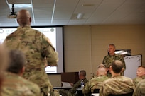 Col. Robert Cooley, right, 85th Support Command deputy commander, talks with battalion command team members during a New Command Teams Orientation held at 85th Support Command Headquarters in Arlington Heights, Ill.,  May 19-20, 2017. The orientation gave battalion command teams and Brigade Support Element staffs assigned to 85th Support Command, but operationally controlled by First Army, a better understanding of the practices and procedures that make up the hybrid relationship between First Army and the 85th SPT CMD.
(U.S. Army photo by Master Sgt. Anthony L. Taylor)