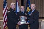 DLA Land and Maritime Deputy Commander and Federal Executive Association Chair James McClaugherty presents the Outstanding Productivity or Process Improvement award to the Fire and Emergency Services for a small agency.