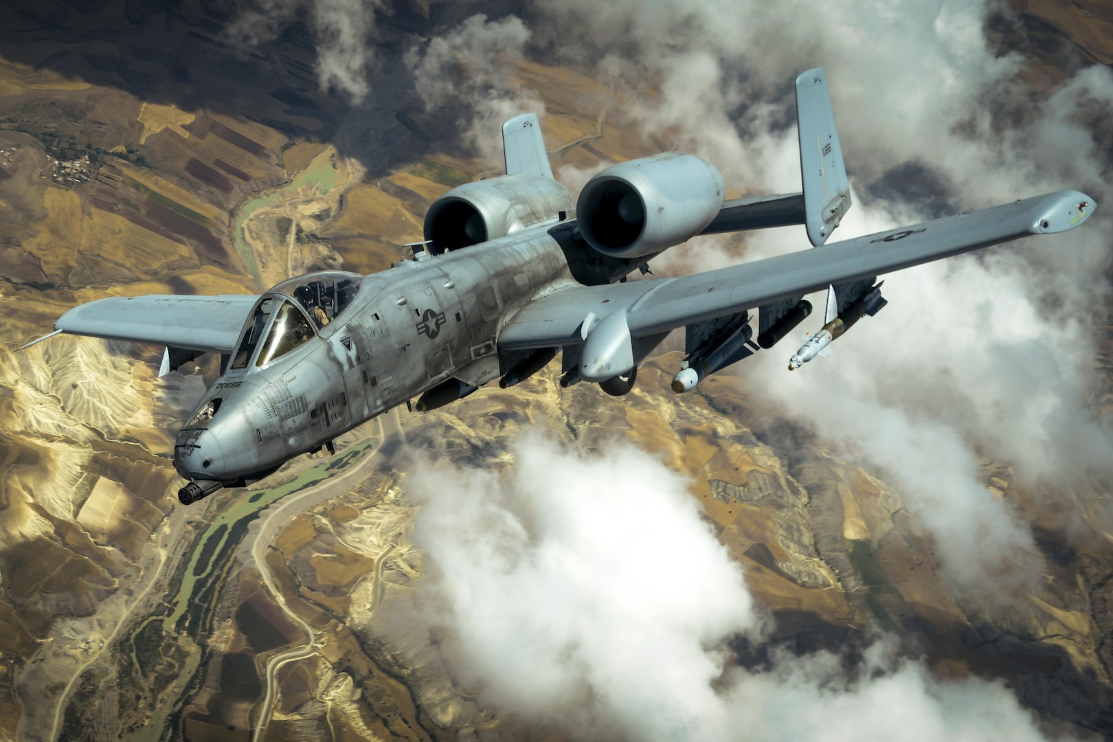 An Air Force A-10 Thunderbolt II flies in an undisclosed location after receiving fuel from a KC-10 Extender while supporting Operation Inherent Resolve, May 31, 2017. The A-10’s combat radius and short takeoff and landing capability permit operations in and out of locations near front lines. Air Force photo by Staff Sgt. Michael Battles