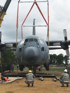 Students attempt to lift a C-130J Special Operations Aircraft that has never been lifted before at the Volk Air National Guard base. The Airmen are students of a Crash Damage or Disabled Aircraft Recover (CDDAR) training course hosted at the base on May 23, 2017. 