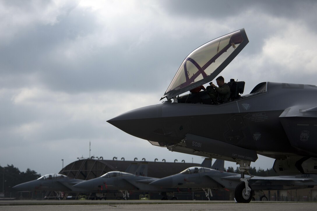 An Air Force F-35A Lightning II pilot from the 34th Fighter Squadron completes preflight checks before departing Royal Air Force Lakenheath, England, May 7, 2017. Eight F-35A aircraft from the squadron, based at Hill Air Force Base, Utah, along with supporting units and equipment, recently completed the first F-35A training deployment to Europe. Air Force photo by Master Sgt. Eric Burks
