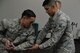 Staff Sgt. Franz Enriquez, 341st Missile Security Forces Squadron defender, and himself a Phoenix Raven, left, and Airman 1st Class Cristian Hernandez Mendoza, 341st MSFS response force leader, practice unarmed self-defense techniques before attending Phoenix Raven training May 25, 2017, at Malmstrom Air Force Base, Mont. The Phoenix Raven program ensures an acceptable level of close quarter security for aircraft transiting airfields where security is unknown or additional security is needed to counter local threats. (U.S. Air Force photo/Airman 1st Class Daniel Brosam)