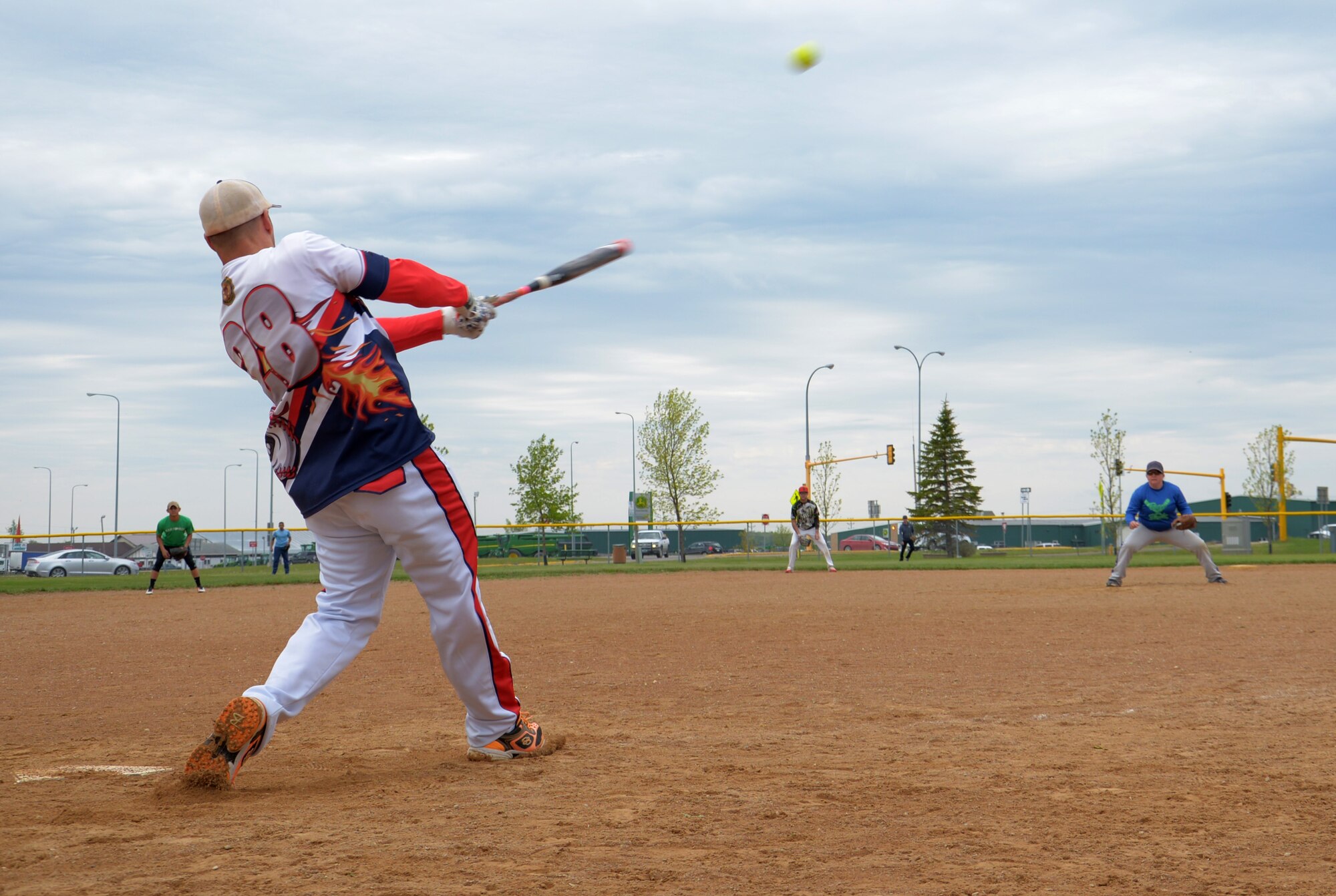 A Grand Forks Airmen bats during the 3rd annual North Dakota military softball tournament at Devils lake N.D., May 25, 2017. Team Minot faced-off against Team Grand Forks and ended with a score of 16-10 in the 3rd annual softball tournament in Devil’s Lake, N.D. (U.S. Air Force photo/Airman 1st Class Dillon Audit)