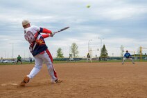 A Grand Forks Airmen bats during the 3rd annual North Dakota military softball tournament at Devils lake N.D., May 25, 2017. Team Minot faced-off against Team Grand Forks and ended with a score of 16-10 in the 3rd annual softball tournament in Devil’s Lake, N.D. (U.S. Air Force photo/Airman 1st Class Dillon Audit)