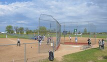 Minot and Grand Forks Air Force Base Airmen play Softball at Roosevelt Park in Devils Lake N.D., May 25, 2017. Before the 3rd annual North Dakota military softball tournament, Minot and Grand Forks Airmen plays a couple of practice games in order to warm up for the tournament. (U.S. Air Force photo/Airman 1st Class Dillon Audit)