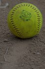 A softball lays in the dirt in a softball field in Devil lake N.D., May 25, 2017. Team Minot faced-off against Team Grand Forks and ended with a score of 16-10 in the 3rd annual North Dakota military softball tournament in Devil’s Lake, N.D. (U.S. Air Force photo/Airman 1st Class Dillon Audit)