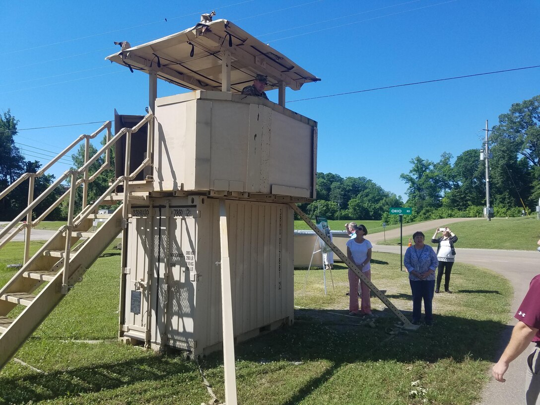 At the U.S. Army Engineer Research and Development Center, after finishing coffee and learning about the Vogel House, guests are provided a campus tour to learn about projects currently being worked on by ERDC employees. The Geotechnical and Structures Laboratory’s Modular Protective System Multipurpose Guard Tower, shown in the photo, provides over watch for entry control point and perimeter protection. The tower may be reconfigured for different uses and has a multi-layered armor panel system allowing tailorable security based on the threat level.