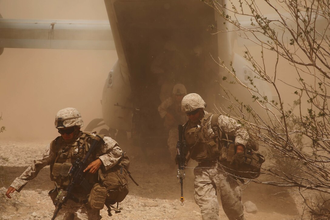 Marines with Marine Medium Tiltrotor Squadron (VMM) 363 insert Marines with 3rd Marine Regiment in a long range raid simulation during Integrated Training Exercise (ITX) 3-17 at Marine Corps Air Station Yuma, Arizona, May 27. ITX is a combined-arms exercise enabling Marines across 3rd Marine Aircraft Wing to operate as an aviation combat element integrated with ground and logistics combat elements as a Marine air-ground task force. More than 650 Marines and 27 aircraft with 3rd MAW are supporting ITX 3-17. (U.S. Marine Corps photo by Sgt. David Bickel/Released)