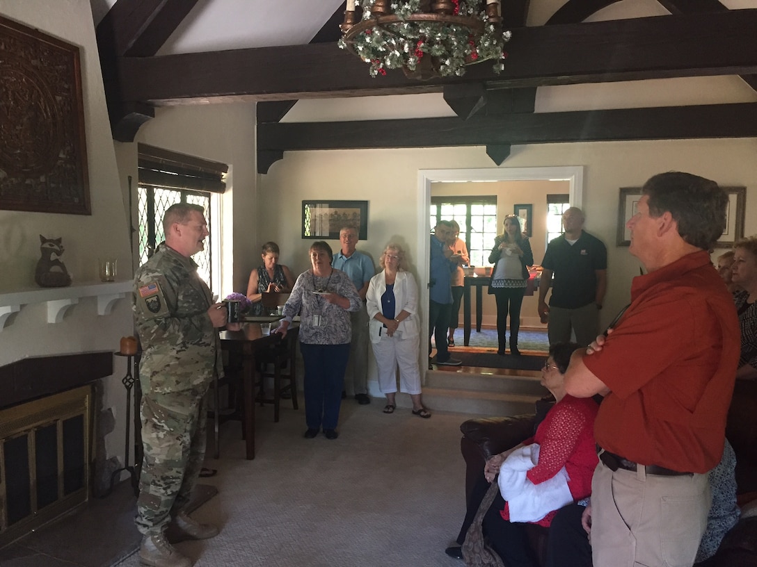 U.S. Army Engineer Research and Development Center’s Commander Col. Bryan Green shown on left, and his wife Yana, not shown in photo, host a Spouses Coffee at their on-campus residence, the Vogel House. Green shares the history behind the house and the property, which is located within the City of Vicksburg, Mississippi.