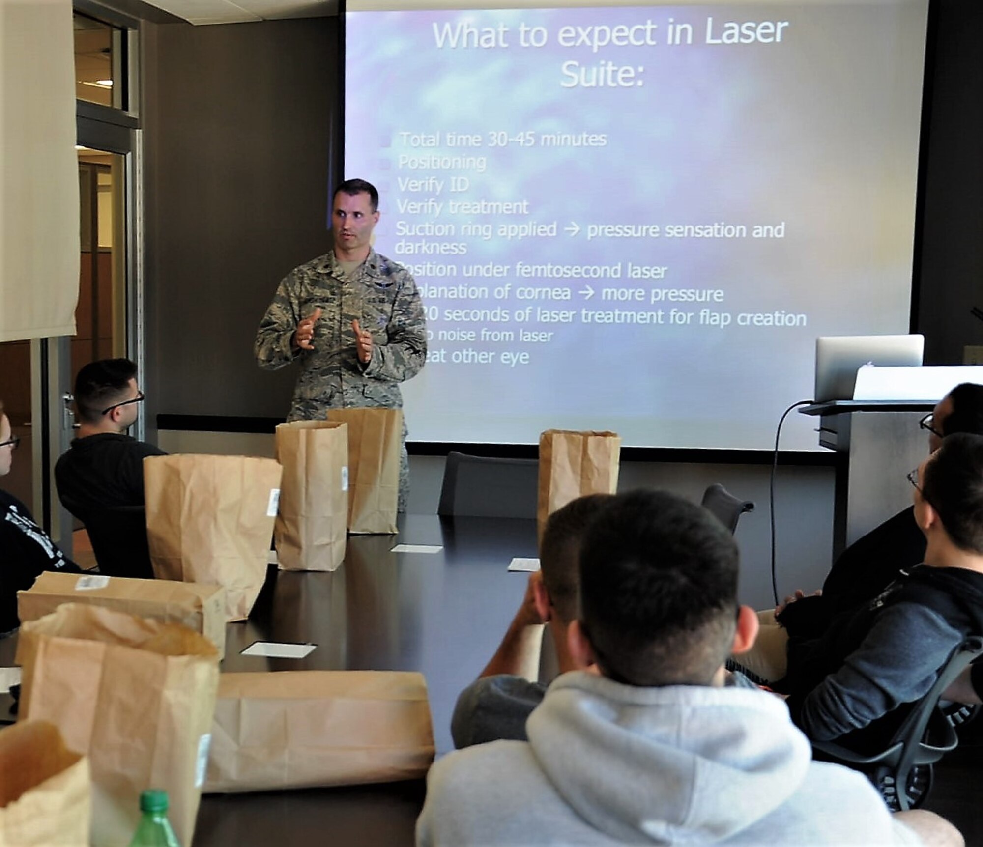 Dr. Williams Gensheimer (standing), 779th Medical Group’s Warfighter Eye Center chief, conducts a briefing for patients scheduled to undergo corneal refractive surgery May 15, 2017 at Joint Base Andrews, Md. Gensheiemer, one of the Center’s ophthalmologists, dsicussed the risks about eye surgery, how he will conduct the procedure step-by-step and what the patients can expect after the CRS is complete. (U.S. Air Force photo by Joe Yanik)