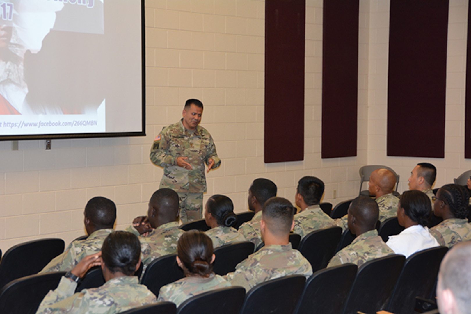 Defense Logistics Agency Aviation Army Maj.  Alex Shimabukuro shares his naturalization story with 28 service members from 18 countries May 30, 2017 as they joined the latest ranks of U.S. citizens during a naturalization ceremony held at Fort Lee, Virginia’s Soldier Support Center.  