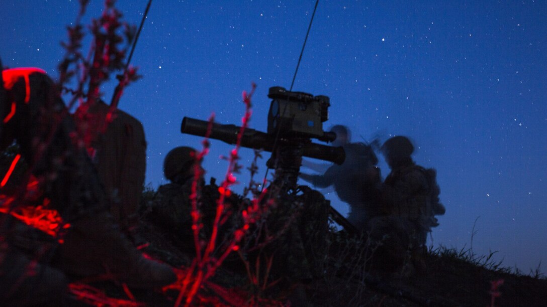 Marines and Canadian soldiers search for simulated enemy targets at night in Wainwright, Alberta, Canada, May 26, 2017, during exercise Maple Resolve 2017. Maple Resolve is an annual, three-week simulated war hosted by the Canadian Army that brings together troops from multiple nations to share tactics while strengthening military ties. The Marines are assigned to the 3rd Air Naval Gunfire Liaison Company. Marine Corps photo by Cpl. Gabrielle Quire