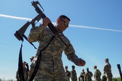 Army Staff Sgt. Rudy Flores, a native of San Antonio, Texas, cleans his weapon as Soldiers assigned to the 98th Support Maintenance Company, 17th Combat Sustainment Support Battalion, U.S. Army Alaska, conduct known distance marksmanship at Pedneau range on Joint Base Elmendorf-Richardson, Alaska, May 31, 2017.  The SMC is a modular maintenance company that provides field maintenance support on an area basis to units in the form of allied trades support; wheeled vehicle recovery; armament; communications; electronics; special electronic devices; ground support equipment; power generation equipment; utility equipment; and test, measurement, and diagnostic equipment maintenance and quality control.