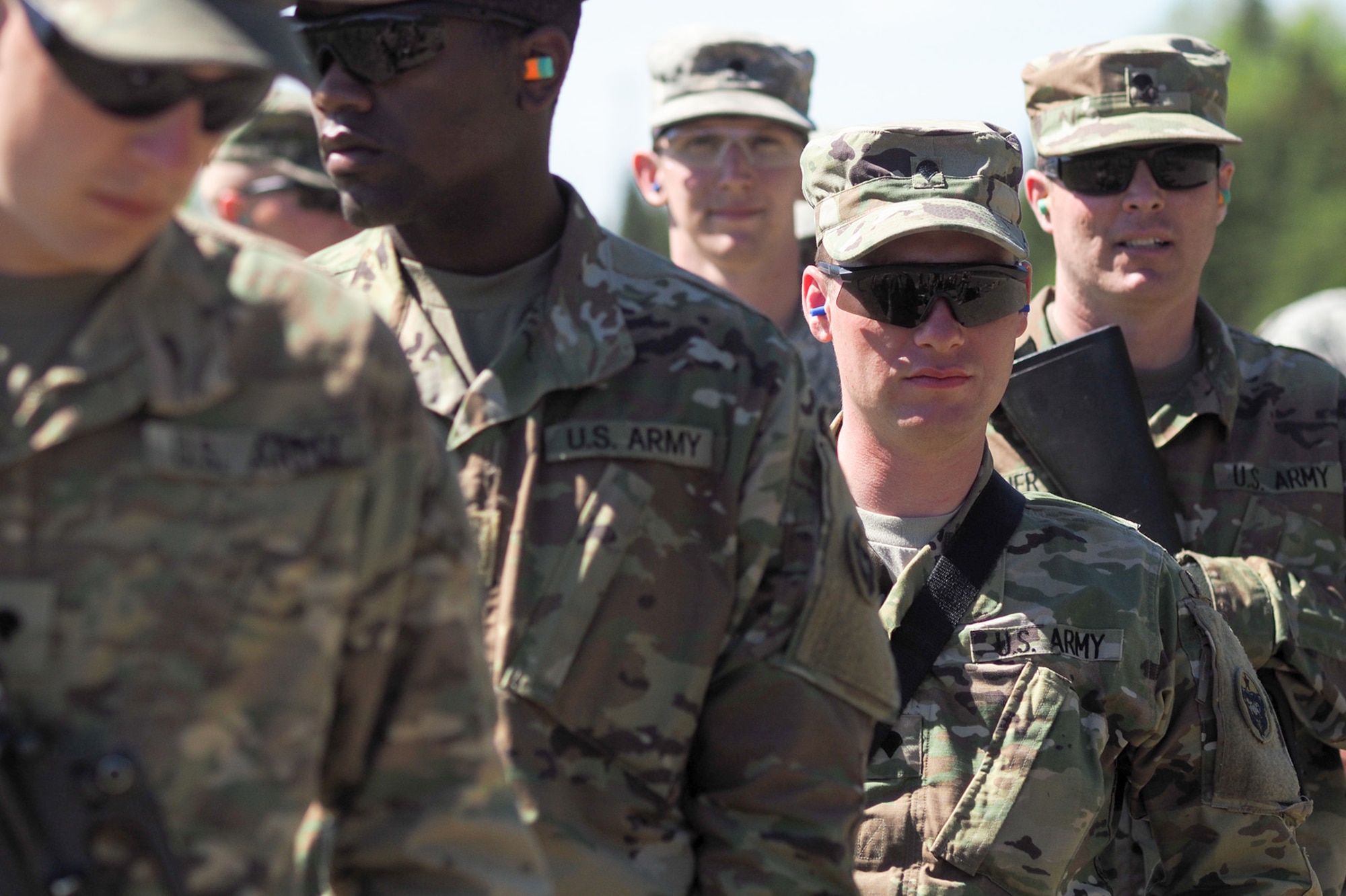 Spc. Karsen Granger, a native of Putnam Station, NY, lines up with fellow Soldiers assigned to the 98th Support Maintenance Company, 17th Combat Sustainment Support Battalion, U.S. Army Alaska, to conduct known distance marksmanship at Pedneau range on Joint Base Elmendorf-Richardson, Alaska, May 31, 2017.  The SMC is a modular maintenance company that provides field maintenance support on an area basis to units in the form of allied trades support; wheeled vehicle recovery; armament; communications; electronics; special electronic devices; ground support equipment; power generation equipment; utility equipment; and test, measurement, and diagnostic equipment maintenance and quality control.