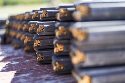 Magazines loaded with 5.56mm ammunition are lined up on a table as Soldiers assigned to the 98th Support Maintenance Company, 17th Combat Sustainment Support Battalion, U.S. Army Alaska, conduct known distance marksmanship at Pedneau range on Joint Base Elmendorf-Richardson, Alaska, May 31, 2017.  The SMC is a modular maintenance company that provides field maintenance support on an area basis to units in the form of allied trades support; wheeled vehicle recovery; armament; communications; electronics; special electronic devices; ground support equipment; power generation equipment; utility equipment; and test, measurement, and diagnostic equipment maintenance and quality control.