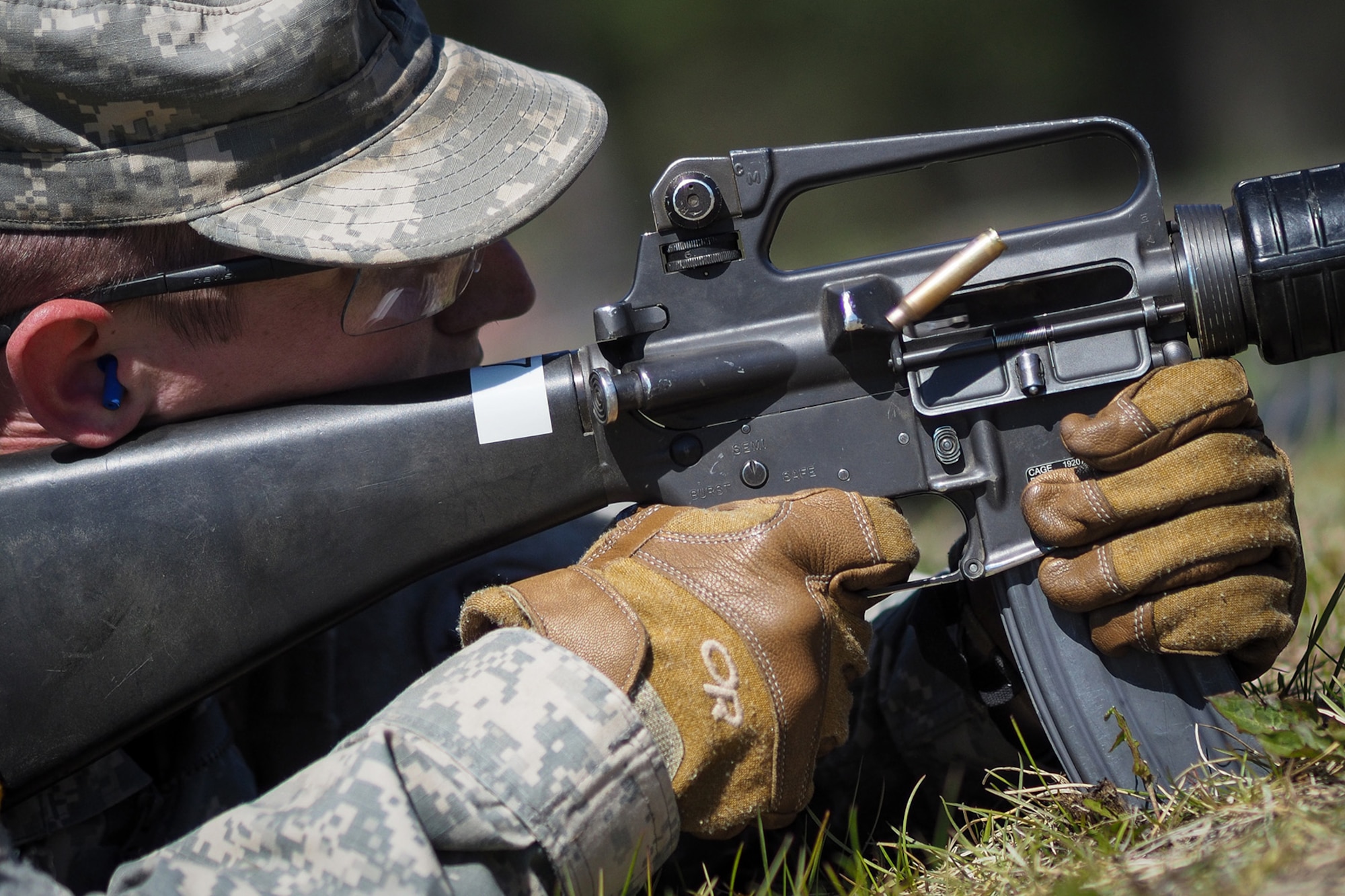 A soldier assigned to the 98th Support Maintenance Company, 17th Combat Sustainment Support Battalion, U.S. Army Alaska, conducts known distance marksmanship at Pedneau range on Joint Base Elmendorf-Richardson, Alaska, May 31, 2017.  The SMC is a modular maintenance company that provides field maintenance support on an area basis to units in the form of allied trades support; wheeled vehicle recovery; armament; communications; electronics; special electronic devices; ground support equipment; power generation equipment; utility equipment; and test, measurement, and diagnostic equipment maintenance and quality control.