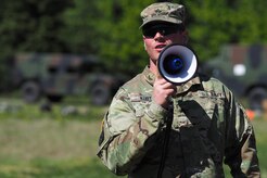 Army Sgt. Jeremy Koby, a native of Silvis, Ill., gives instructions to Soldiers assigned to the 98th Support Maintenance Company, 17th Combat Sustainment Support Battalion, U.S. Army Alaska, conducting known distance marksmanship at Pedneau range on Joint Base Elmendorf-Richardson, Alaska, May 31, 2017.  The SMC is a modular maintenance company that provides field maintenance support on an area basis to units in the form of allied trades support; wheeled vehicle recovery; armament; communications; electronics; special electronic devices; ground support equipment; power generation equipment; utility equipment; and test, measurement, and diagnostic equipment maintenance and quality control.