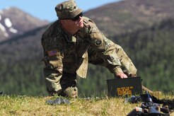 Spc. Cameron Henn, a native of Arlington, Texas, picks up expended 5.56mm casings on the firing line as Soldiers assigned to the 98th Support Maintenance Company, 17th Combat Sustainment Support Battalion, U.S. Army Alaska, conduct known distance marksmanship at Pedneau range on Joint Base Elmendorf-Richardson, Alaska, May 31, 2017.  The SMC is a modular maintenance company that provides field maintenance support on an area basis to units in the form of allied trades support; wheeled vehicle recovery; armament; communications; electronics; special electronic devices; ground support equipment; power generation equipment; utility equipment; and test, measurement, and diagnostic equipment maintenance and quality control.