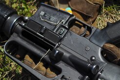 An M16A2 rifle is seen on the ground after Soldiers assigned to the 98th Support Maintenance Company, 17th Combat Sustainment Support Battalion, U.S. Army Alaska, conduct known distance marksmanship at Pedneau range on Joint Base Elmendorf-Richardson, Alaska, May 31, 2017.  The SMC is a modular maintenance company that provides field maintenance support on an area basis to units in the form of allied trades support; wheeled vehicle recovery; armament; communications; electronics; special electronic devices; ground support equipment; power generation equipment; utility equipment; and test, measurement, and diagnostic equipment maintenance and quality control.