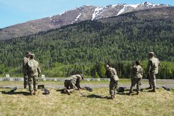 Soldiers assigned to the 98th Support Maintenance Company, 17th Combat Sustainment Support Battalion, U.S. Army Alaska, pick up expended casings while conducting known distance marksmanship at Pedneau range on Joint Base Elmendorf-Richardson, Alaska, May 31, 2017.  The SMC is a modular maintenance company that provides field maintenance support on an area basis to units in the form of allied trades support; wheeled vehicle recovery; armament; communications; electronics; special electronic devices; ground support equipment; power generation equipment; utility equipment; and test, measurement, and diagnostic equipment maintenance and quality control.