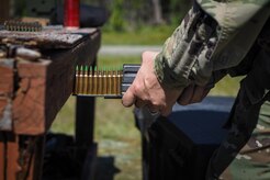 A soldier assigned to the 98th Support Maintenance Company, 17th Combat Sustainment Support Battalion, U.S. Army Alaska, loads a magazine with 5.56mm ammunition before conducting known distance marksmanship at Pedneau range on Joint Base Elmendorf-Richardson, Alaska, May 31, 2017.  The SMC is a modular maintenance company that provides field maintenance support on an area basis to units in the form of allied trades support; wheeled vehicle recovery; armament; communications; electronics; special electronic devices; ground support equipment; power generation equipment; utility equipment; and test, measurement, and diagnostic equipment maintenance and quality control.