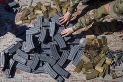 Soldiers assigned to the 98th Support Maintenance Company, 17th Combat Sustainment Support Battalion, U.S. Army Alaska, load M16 magazines before conducting known distance marksmanship at Pedneau range on Joint Base Elmendorf-Richardson, Alaska, May 31, 2017.  The SMC is a modular maintenance company that provides field maintenance support on an area basis to units in the form of allied trades support; wheeled vehicle recovery; armament; communications; electronics; special electronic devices; ground support equipment; power generation equipment; utility equipment; and test, measurement, and diagnostic equipment maintenance and quality control.