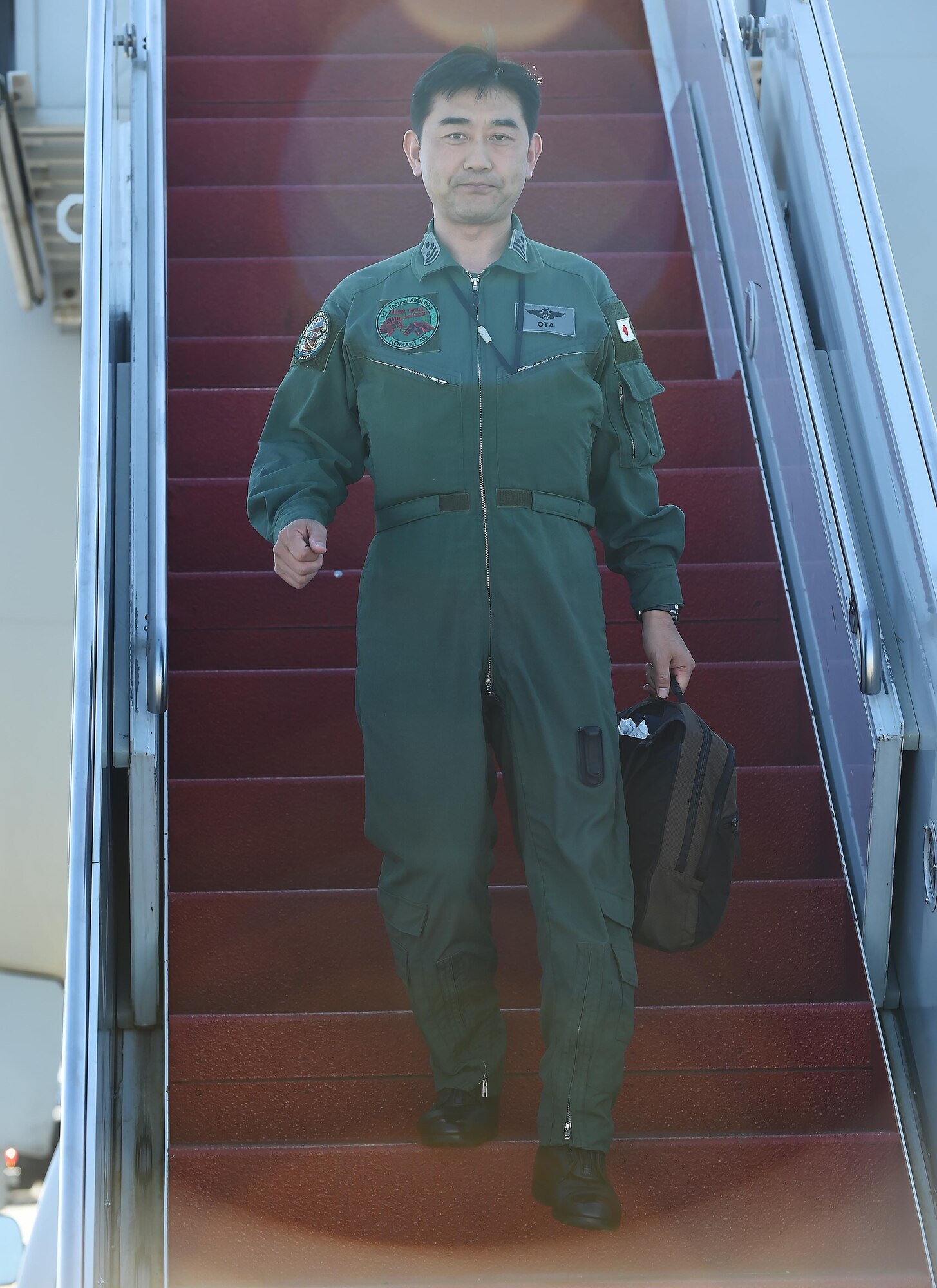 Japanese Air Self-Defense Force Col. Masashi Ota exits a KC-767J Aerial Refueling Tanker on Joint Base Elmendorf-Richardson, Alaska, June 1, 2017. Ota and his team are participating in a joint exercise. 