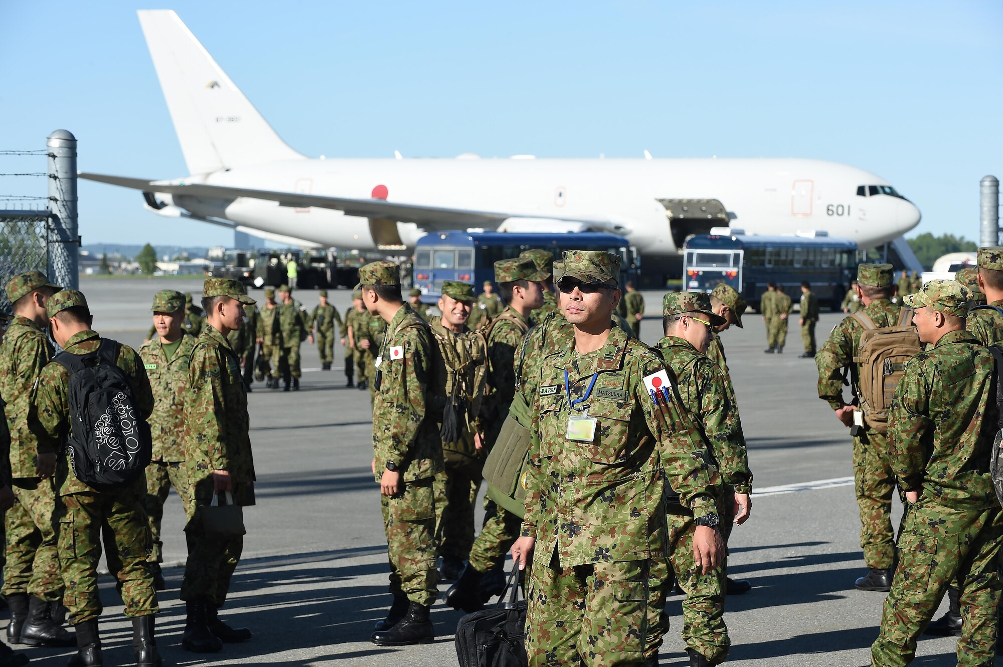 Japanese military members gather after arriving at Joint Base Elmendorf-Richardson, Alaska, June 1, 2017. They are here in support of a joint exercise.