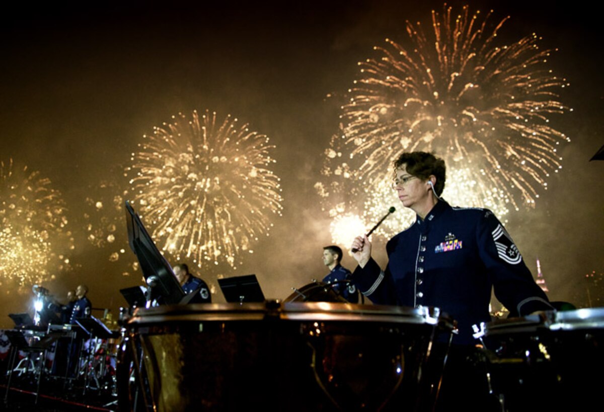 Chief Master Sgt. Erica Montgomery performs during the 2016 Macy's 4th of July fireworks celebration. Click on our web calendar to see a complete list of this years Independence Day concerts. (Photo by Chief Master Sgt. Bob Kamholz)