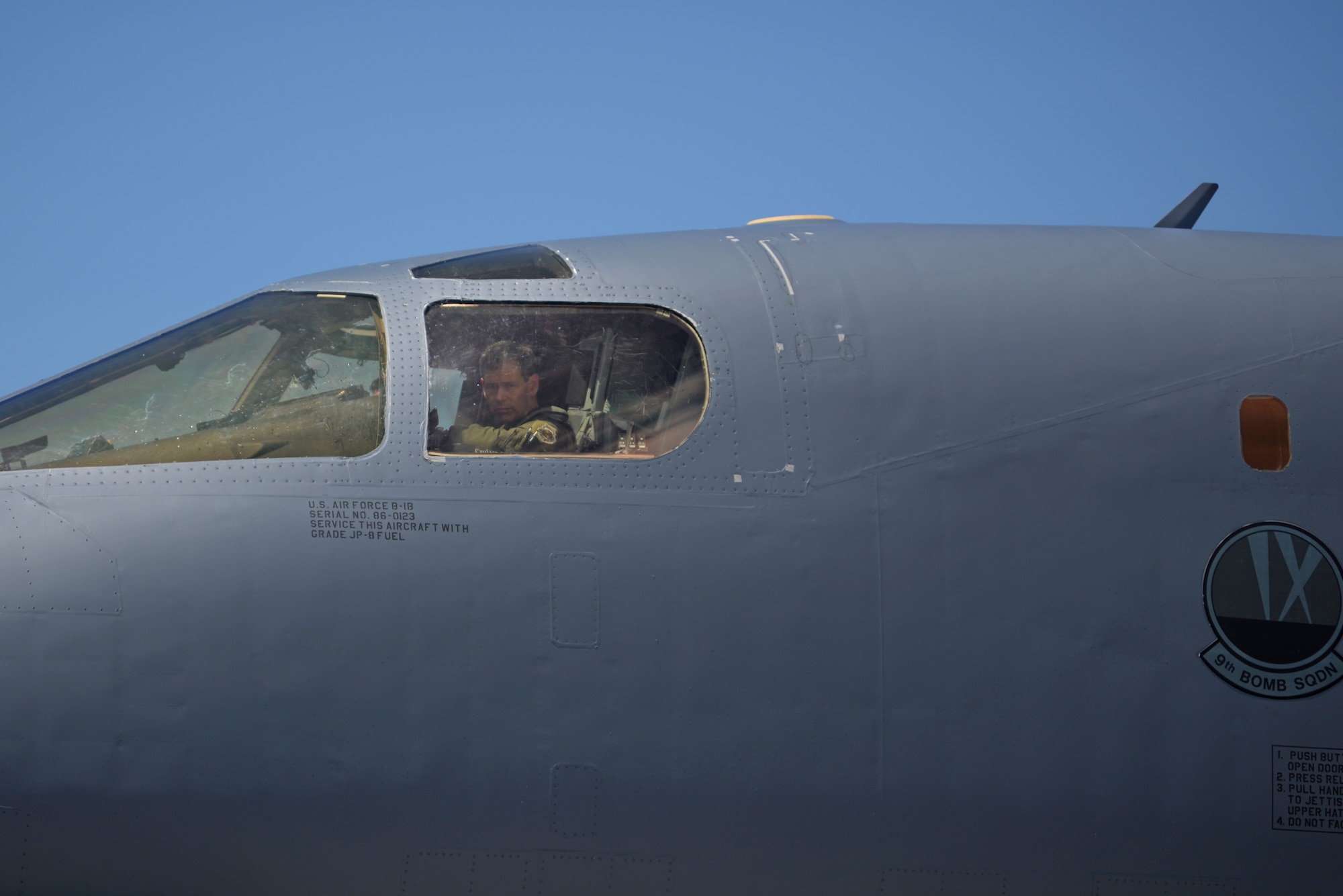 U.S. Air Force Lt. Gen. Kenneth S. Wilsbach, 11th Air Force commander, looks out the window of a B-1B Lancer June 2, 2017, at Andersen Air Force Base, Guam. Wilsbach visited Guam to interact with Airmen and leaders from Andersen AFB and Naval Base Guam. (U.S. Air Force photo by Airman 1st Class Gerald R. Willis)