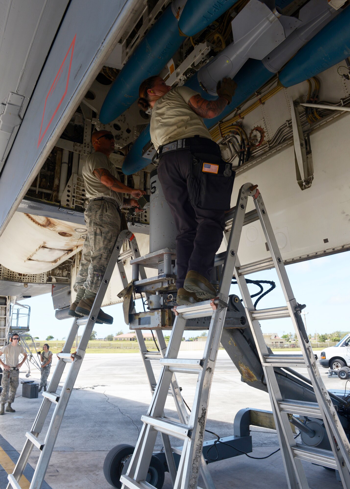 Airmen from the 36th Expeditionary Aircraft Maintenance Squadron load Bomb Disposal Unit 50 into a B-1 Lancer May 30, 2017, at Andersen Air Force Base, Guam. The team, deployed here from Dyess AFB, TX, loads munitions such as Joint Direct Attack Munitions, Joint Air-to-Surface Standoff Missiles or when practicing, BDU-50 and 56’s depending on what the mission requires. (U.S. Air Force photo by Senior Airman Cierra Presentado/Released)